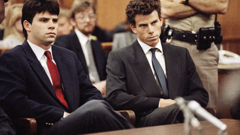 Lyle, left, and Erik Menendez sit in Beverly Hills Municipal Court during their trial for the 1989 murder of their parents, Kitty and José Menendez. Nick Ut/AP